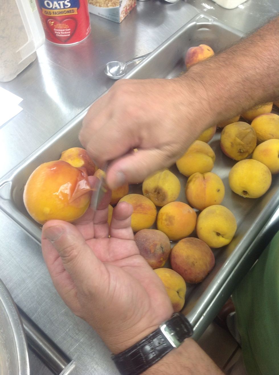 Cook peaches in the combi at 212F (100C) for 6 min, pit and peel off the skin