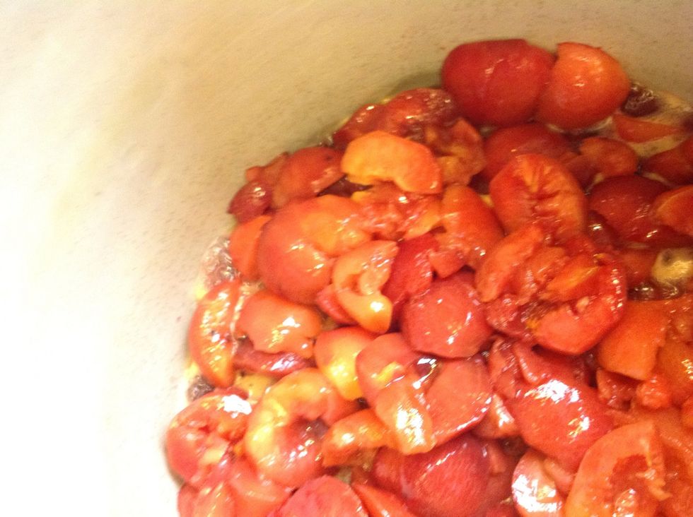 Cook plums until soft