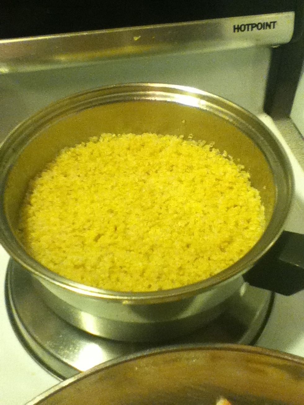 Cook quinoa per package directions. Set aside.