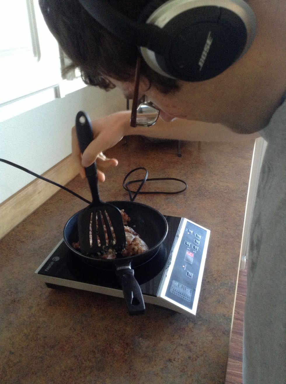 Cook sausage until it is brown (fully cooked). Make sure to stir the sausage with a spatula while it is cooking to prevent it from burning.