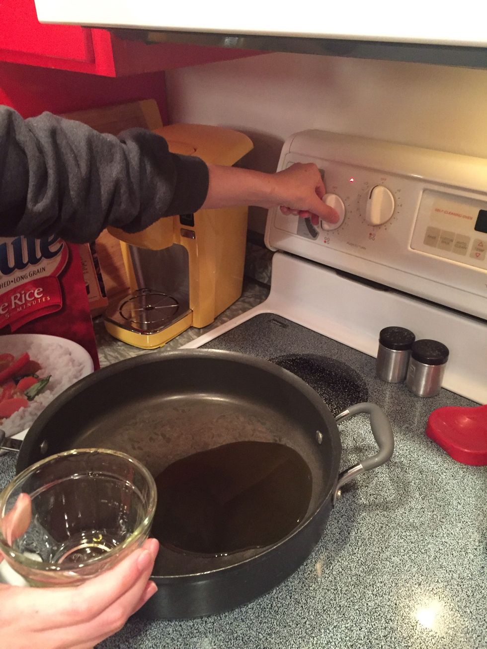 Cook sesame oil over medium heat.