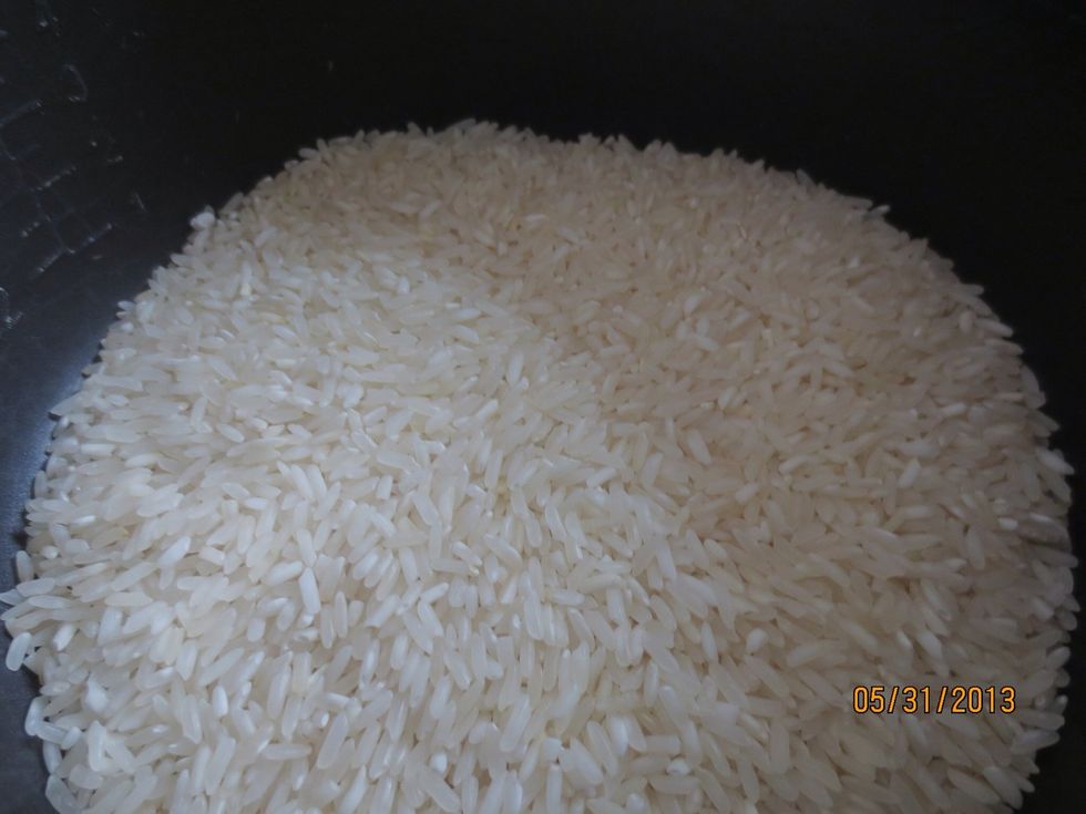 Cook some rice in a rice cooker