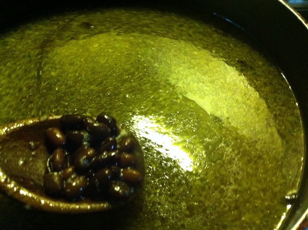 Cook soup down until it comes together into thick balance or stock, beans, rice and meat.