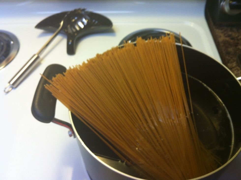 Cook spaghetti according to box. I always add a little garlic salt to the water for a little flavor but it's not neccessary