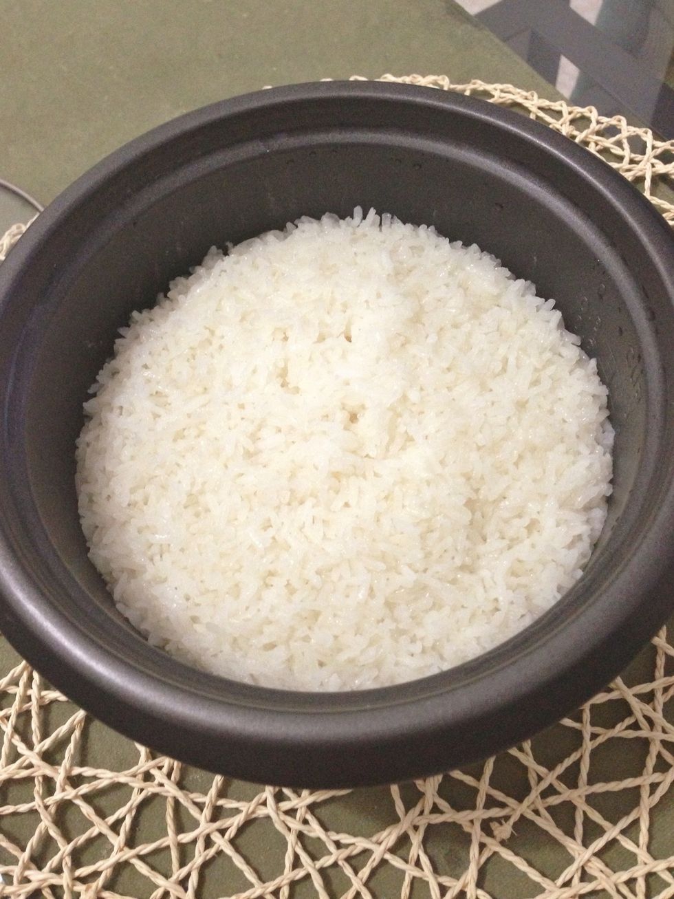 Cook sticky rice in rice cooker. This is 2.5 cups rice. Water should be at a lesser quantity when cooking sticky rice. I used 2cups of water for 2.5cups rice.