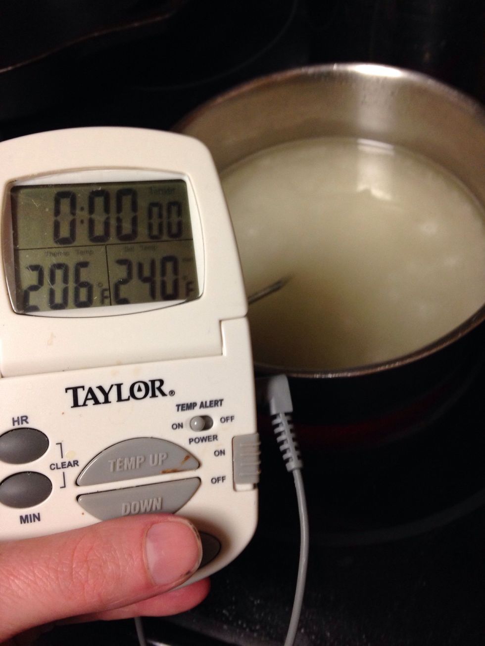 Cook sugar mixture to 240F and immediately remove from heat.