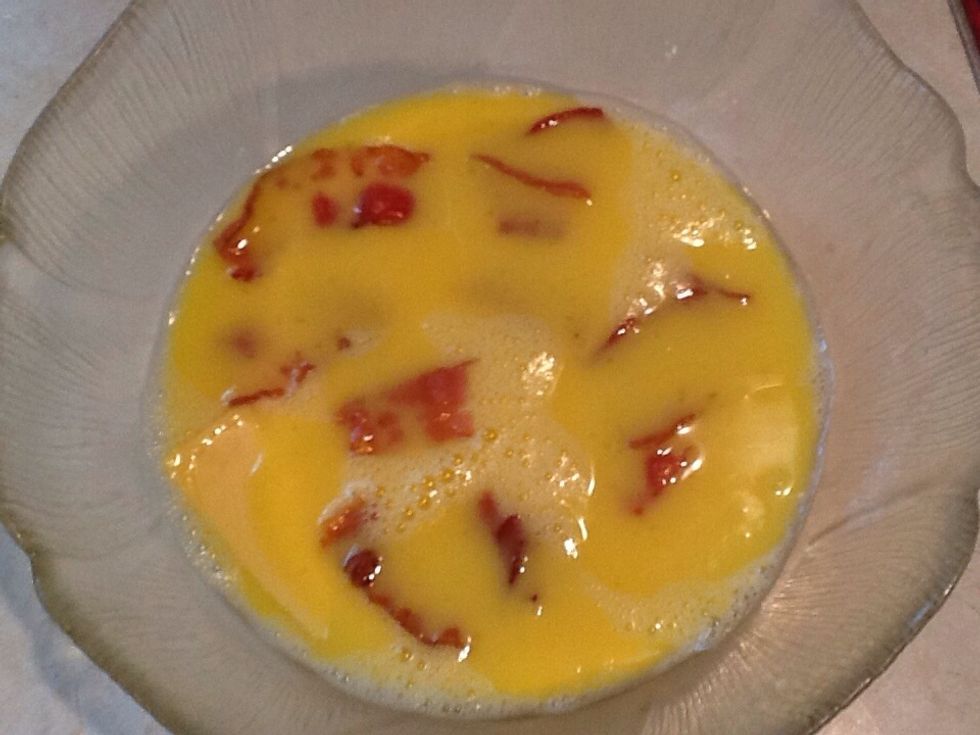 Cook the bacon and put into the bowl with the cheese.