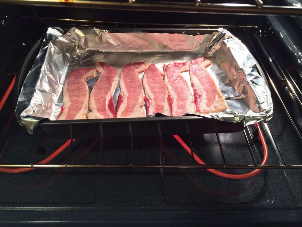 Cook the bacon until it's to your desired crispness. It only takes a couple minutes in a 425\u00b0 oven. You can also cook it on the stove, if you prefer.