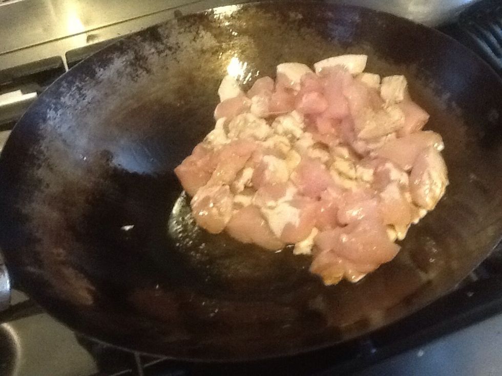 Cook the chicken till it browns.