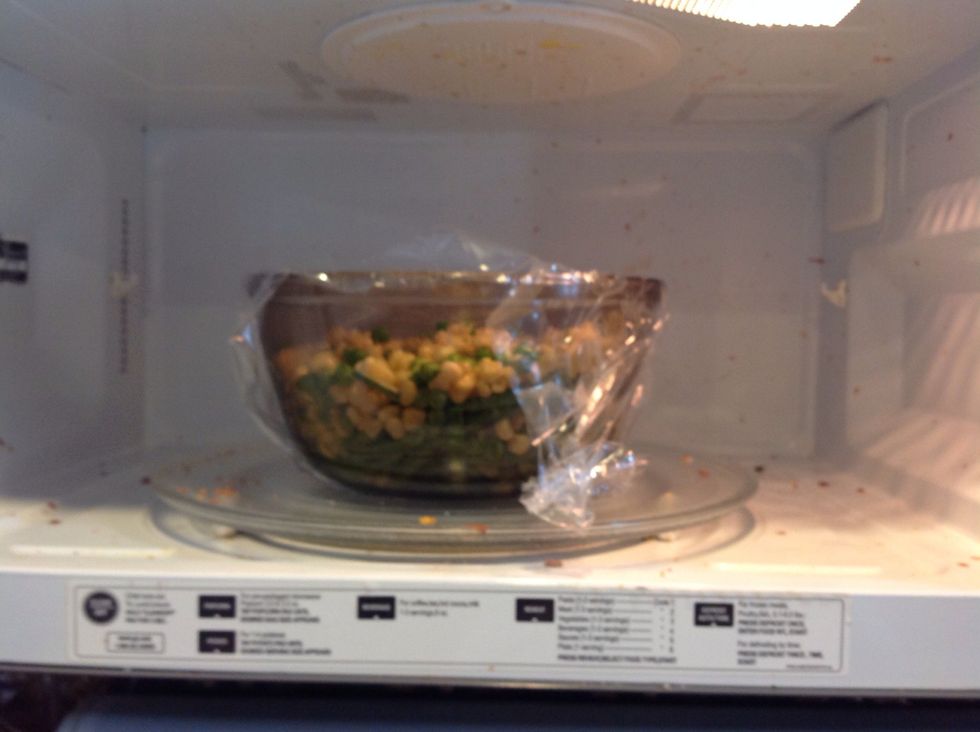 Cook the corn, peas, and, green beans.