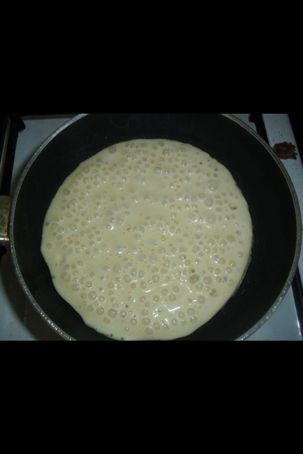 Cook the first side approximately two minutes two minutes or until the bubbles that form on the top pop.