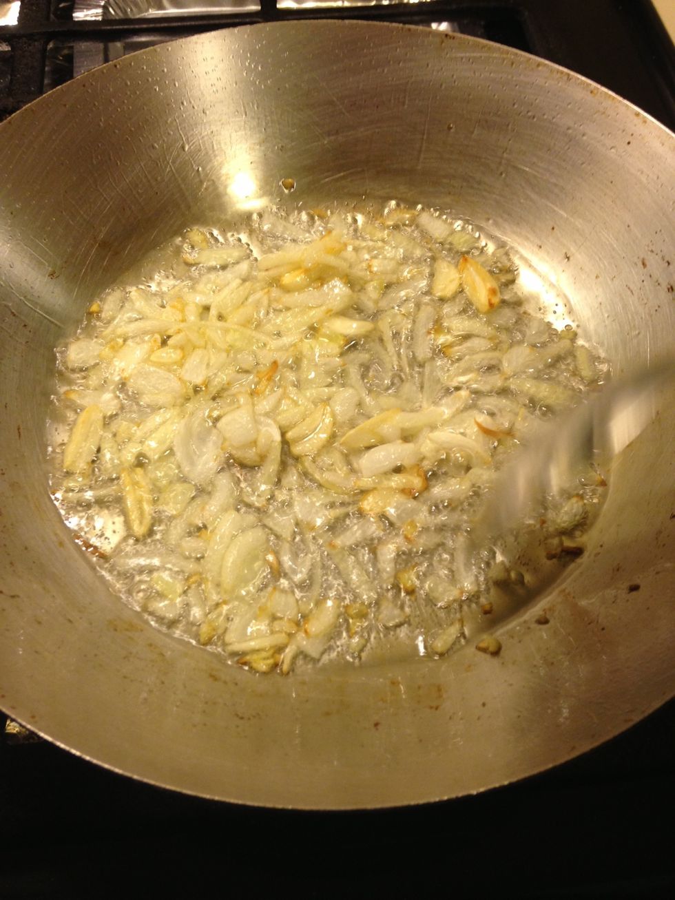 Cook the onions and garlic in the oil until they just start to brown, like pictured above.