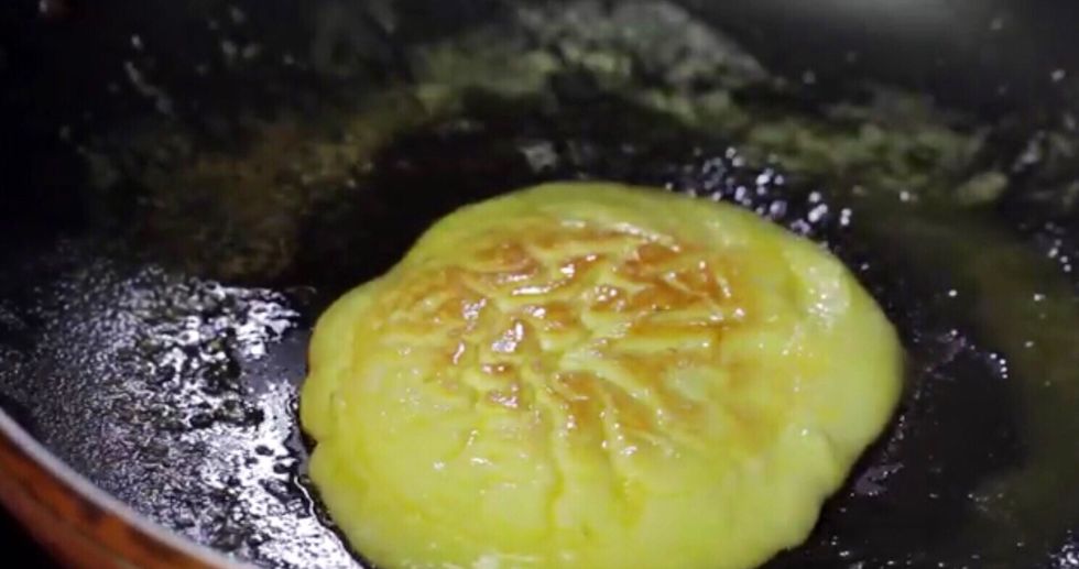 Cook the other side until golden and remove from pan. Place on a cool plate you will serve your pancake on.