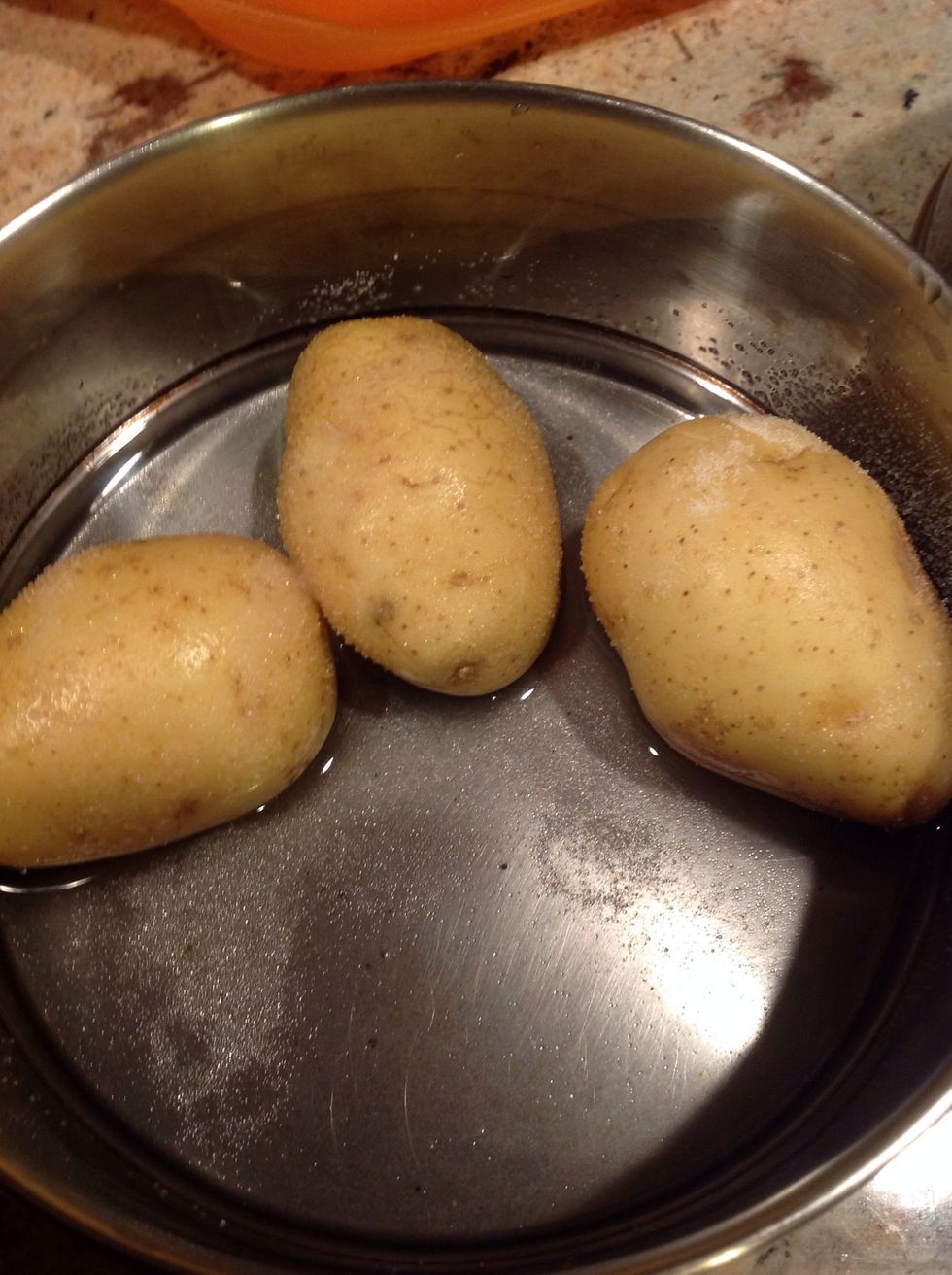 Cook the potatoes.