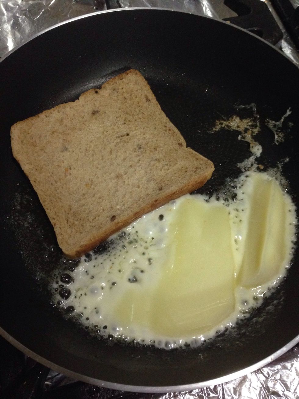 Cook the Toast with the butter and Mozzarella cheese on the side.