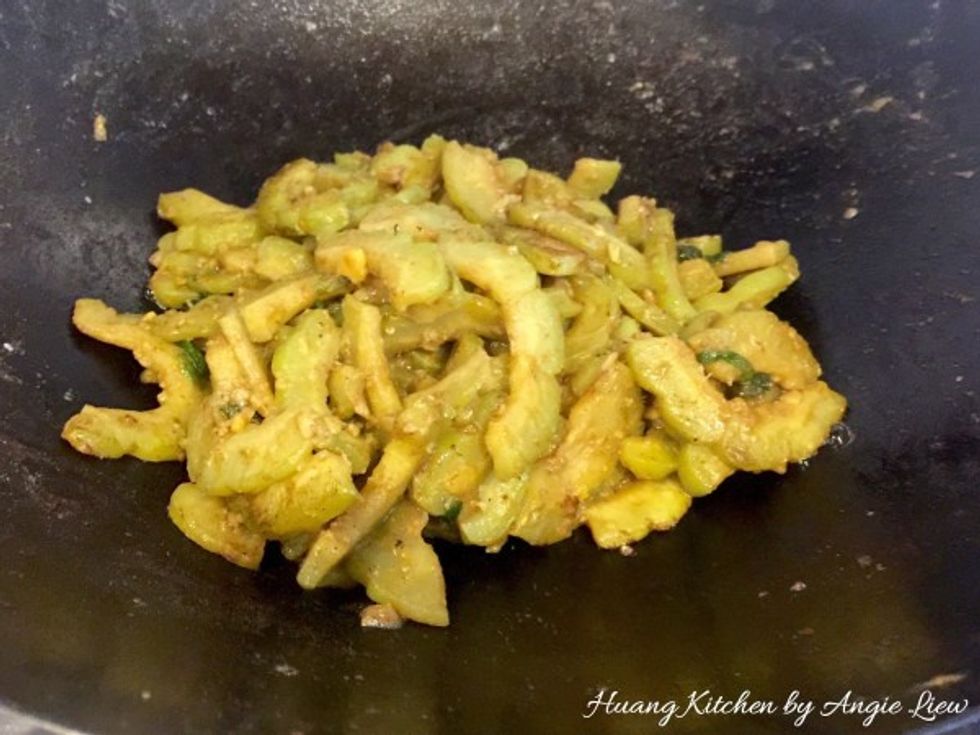 Cook till water dries up and bitter gourd turns soft, about 3 to 4 minutes. Season to taste. And we're done!