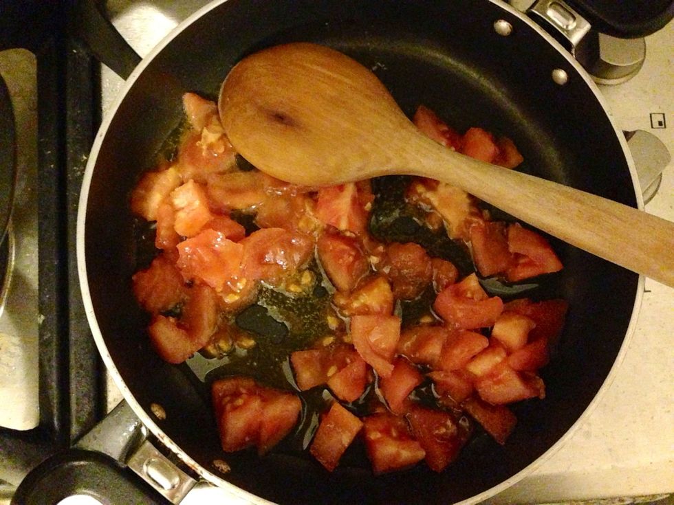 Cook tomatoes in olive oil and smash them while stirring