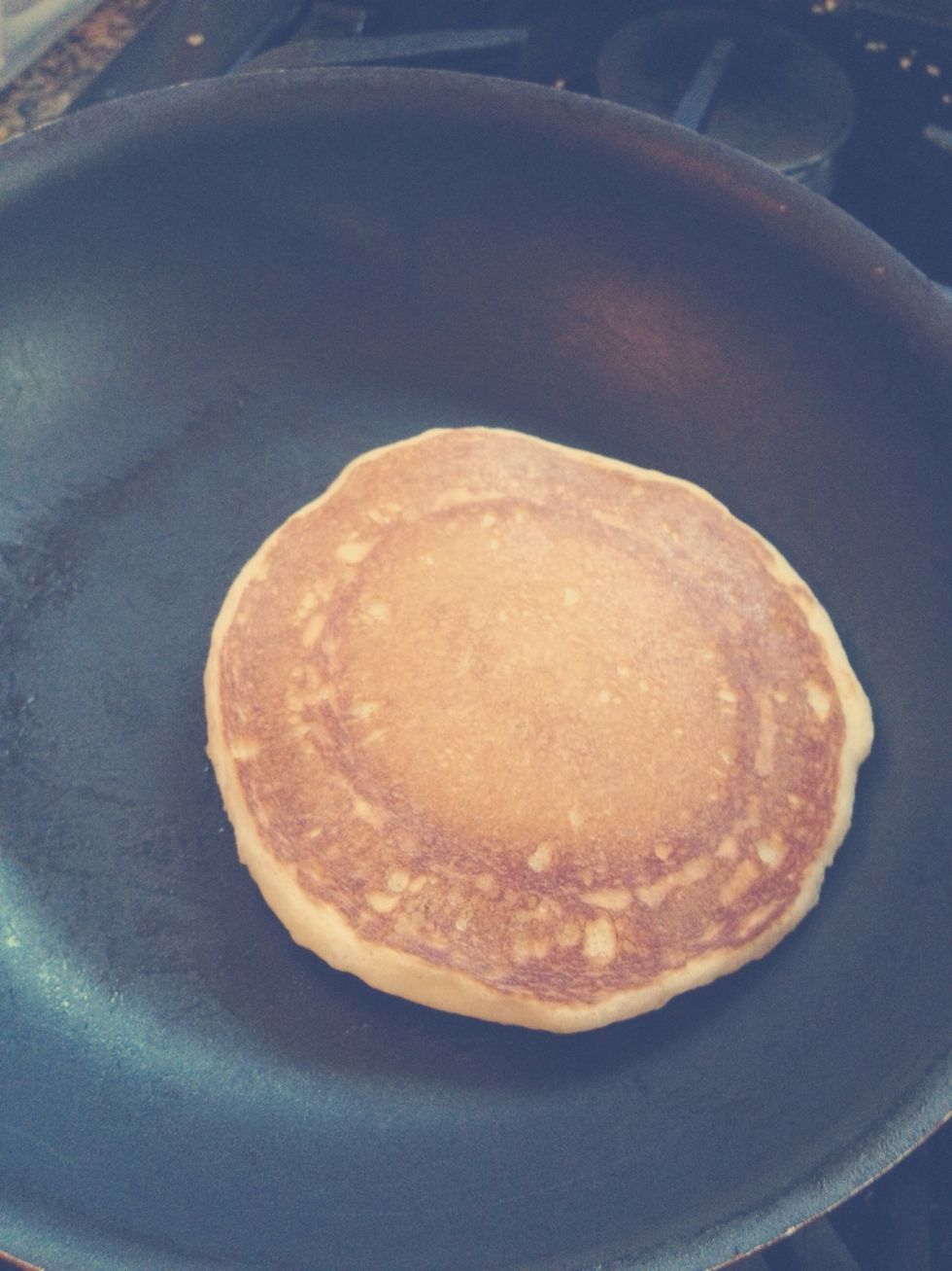 Cook until bubbles appear on top and flip with a spatula.