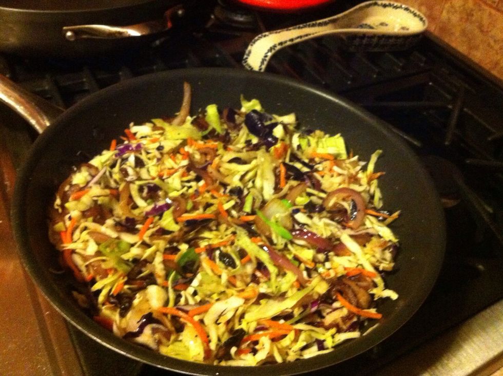 Cook until cabbage starts to wilt.