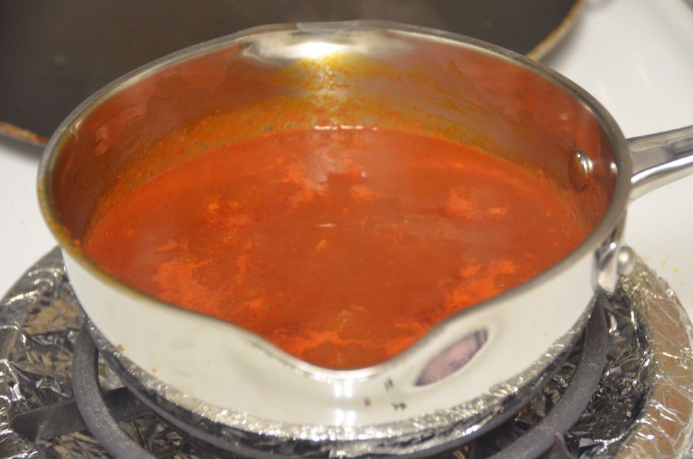 Cook until it boils and then turn off the heat. Add the sugar and stir .