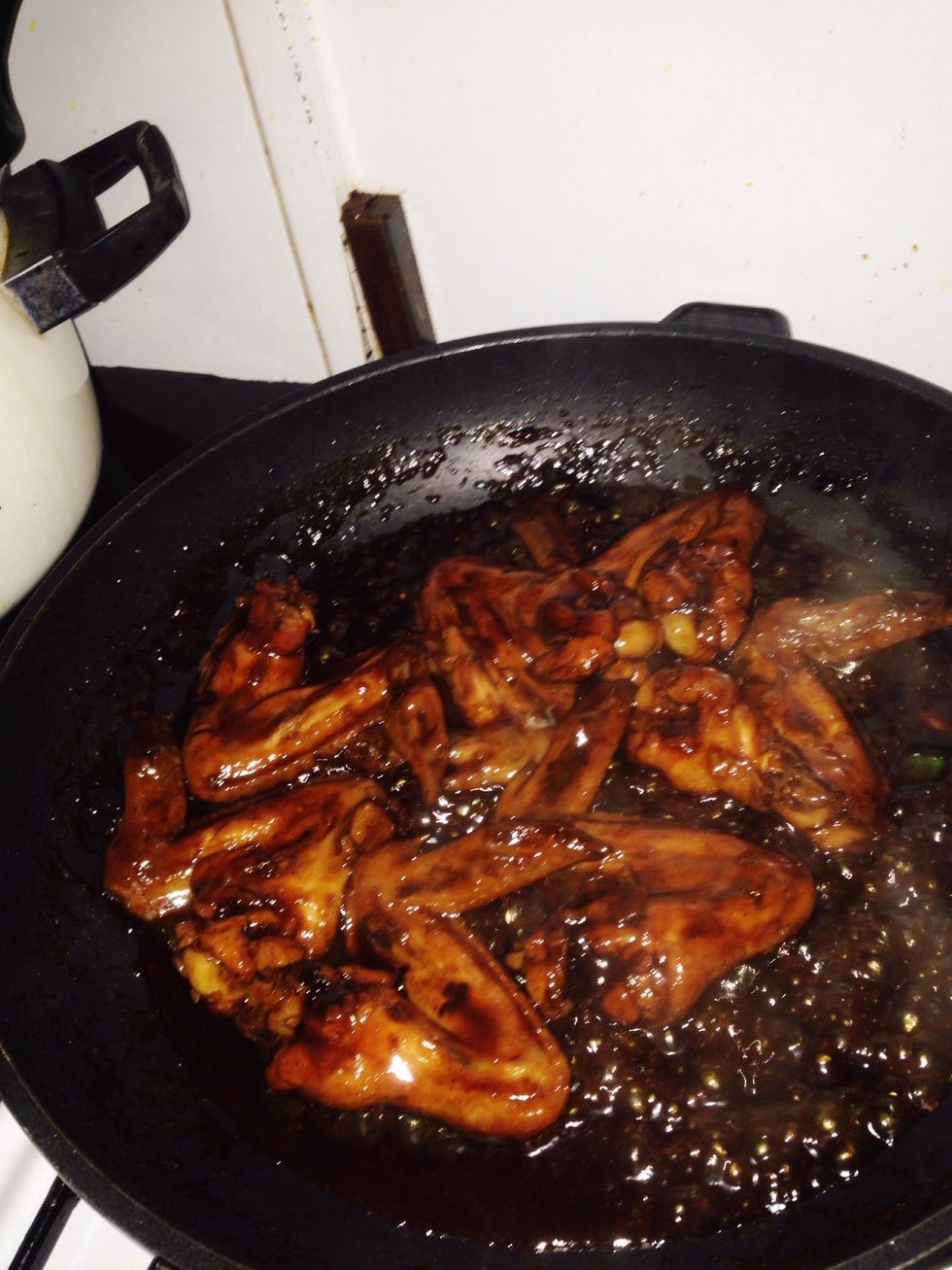 Cook until the chicken is cooked AND most liquid is gone like that. Then remove the heat