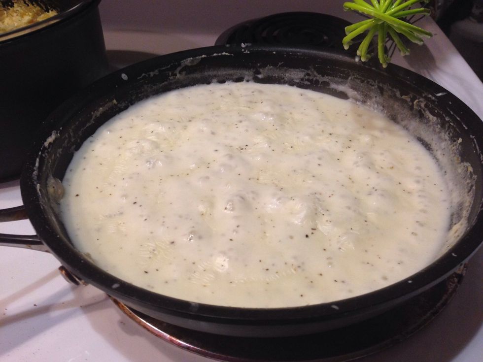 Cook until the sauce thickens and you see bubbles like in the picture.  One the sauce has emulsified add the mushrooms and pasta to it.