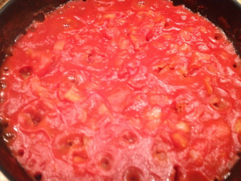 Cook until the tomatoes are quite thick. You will get bubble marks like in the picture