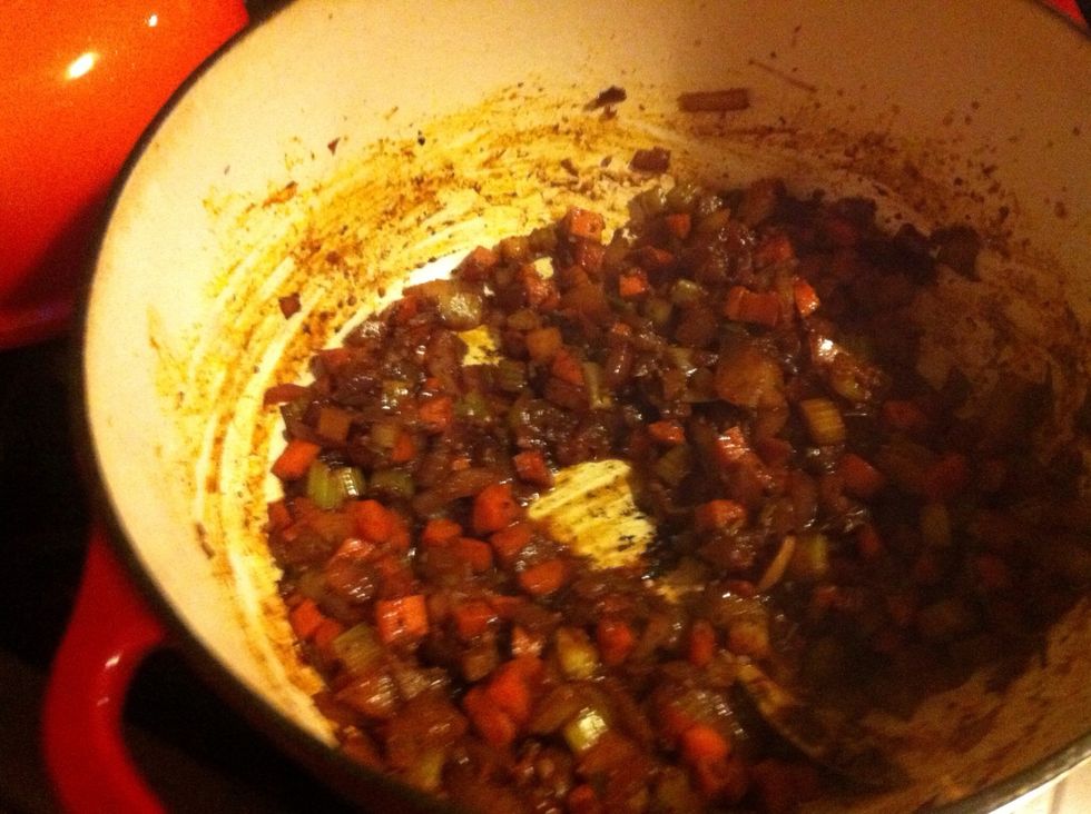 Cook until wine has evaporated.