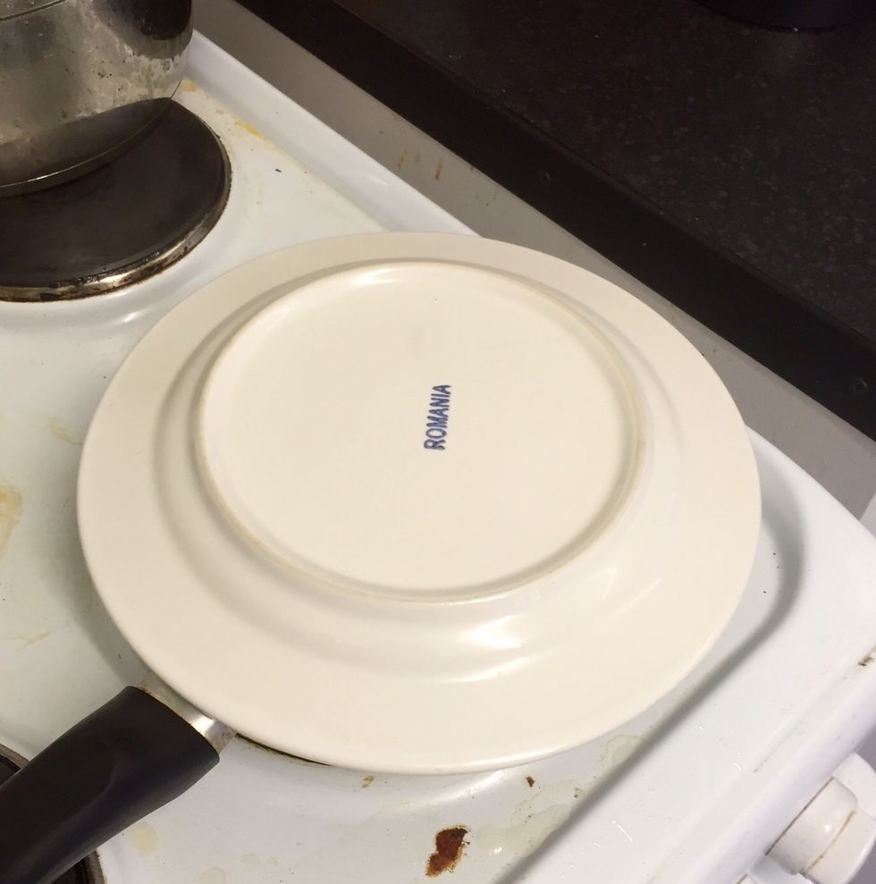 Cook Until you see the egg is done, put the plate on and then hold it tight when you flip the pan