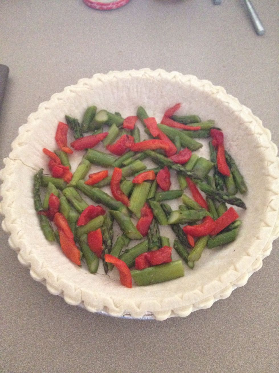 Cook veggies and add to the empty pie crust (in this picture I used roasted asparagus and roasted red peppers)