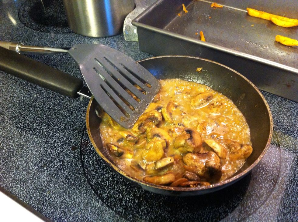 Cook white mushrooms.