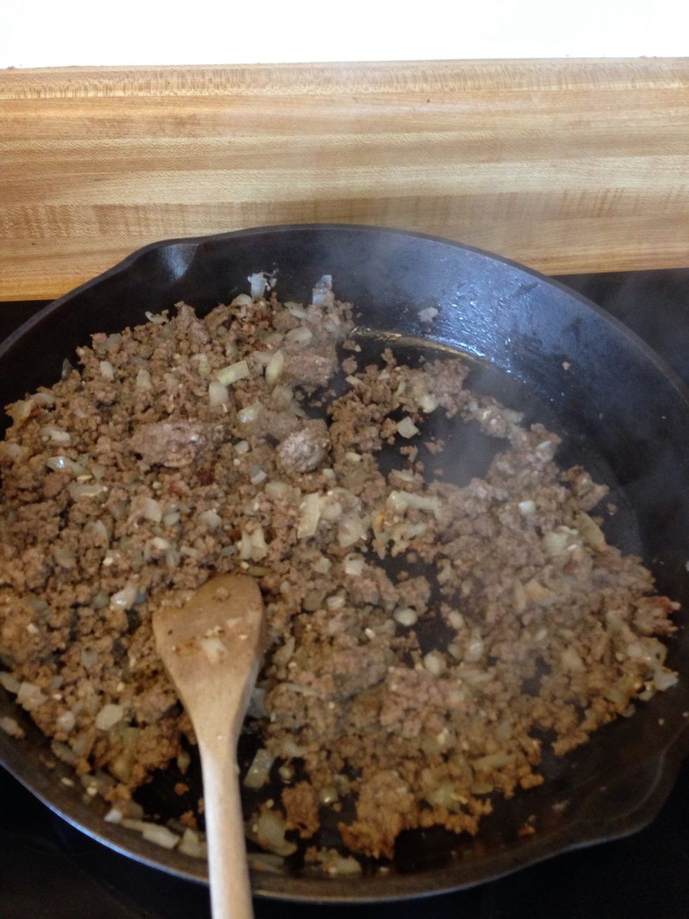 Cook your beef, onions, and garlic. I omitted the butter.