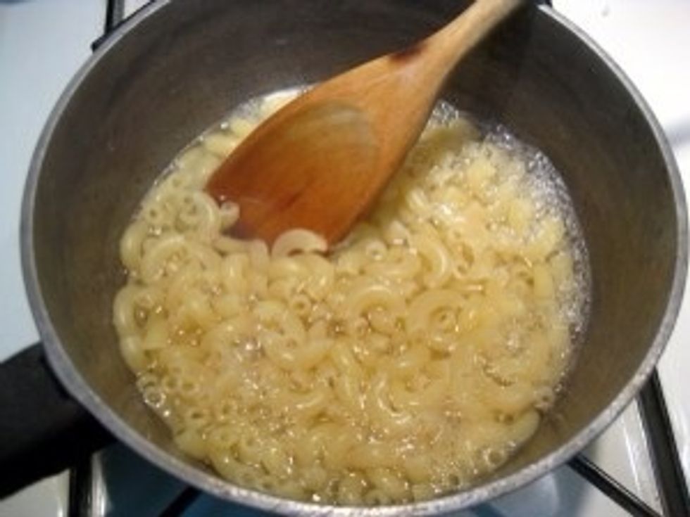 Cook your macaroni then drain and refresh under cold water, set aside