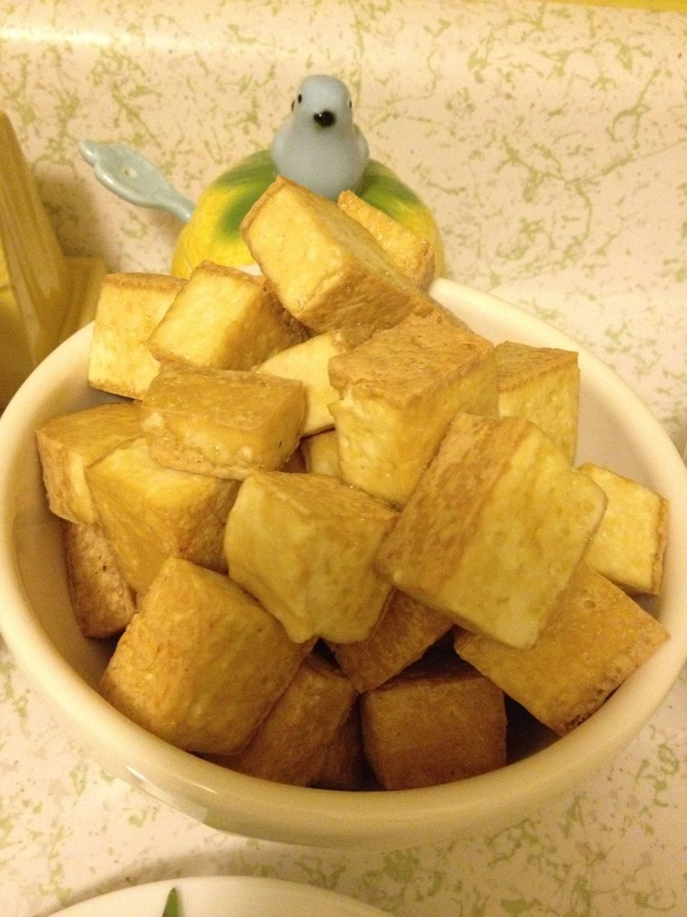 cooked crispy tofu cubes.