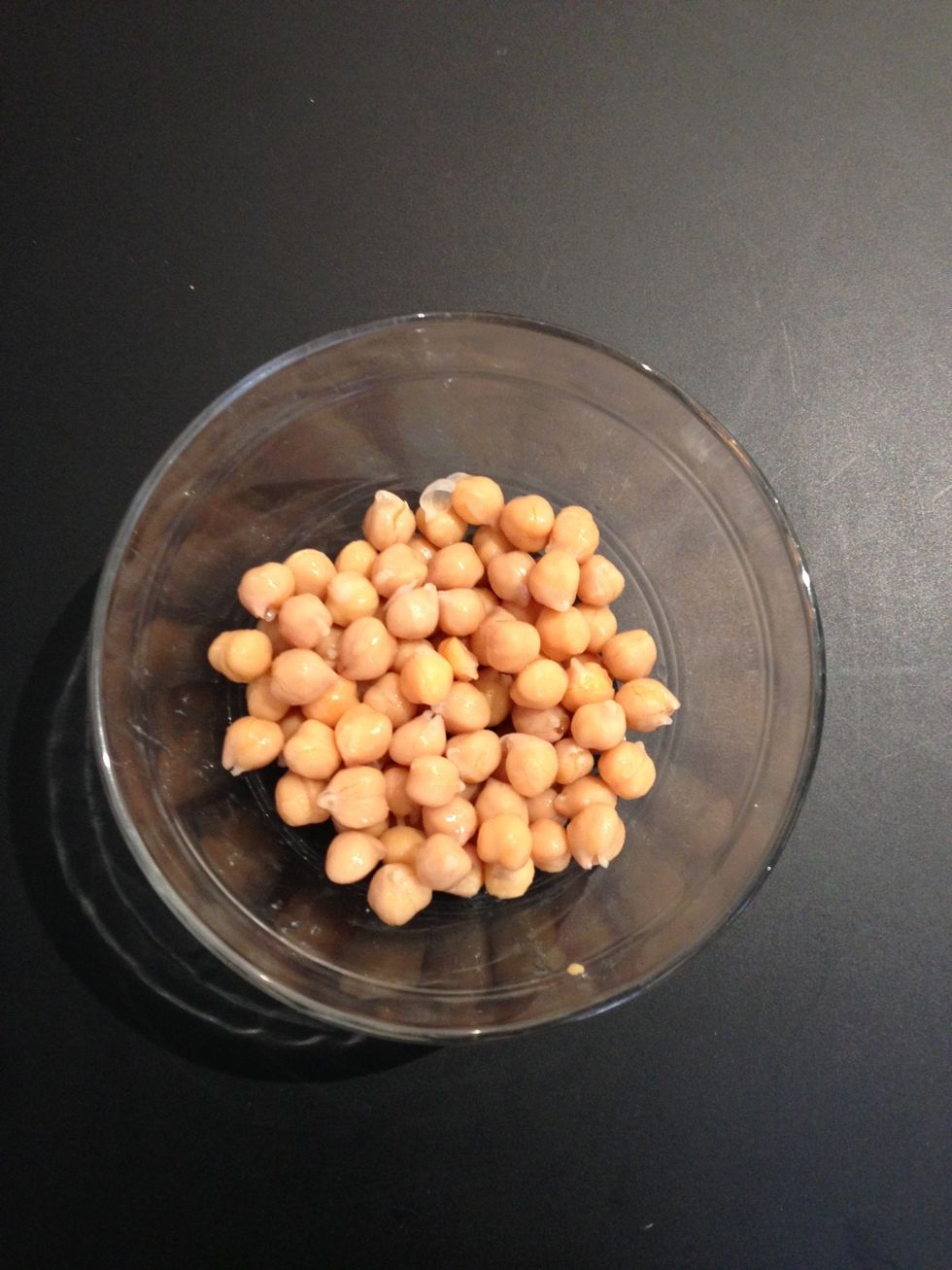 Cooked garbanzo beans. Today I bought them cooked.... But in a glass jar and organic. Wash them well