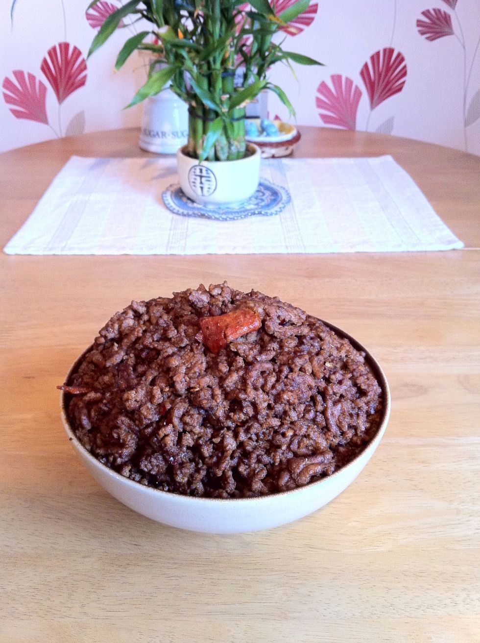 Cooked, spiced, minced beef.