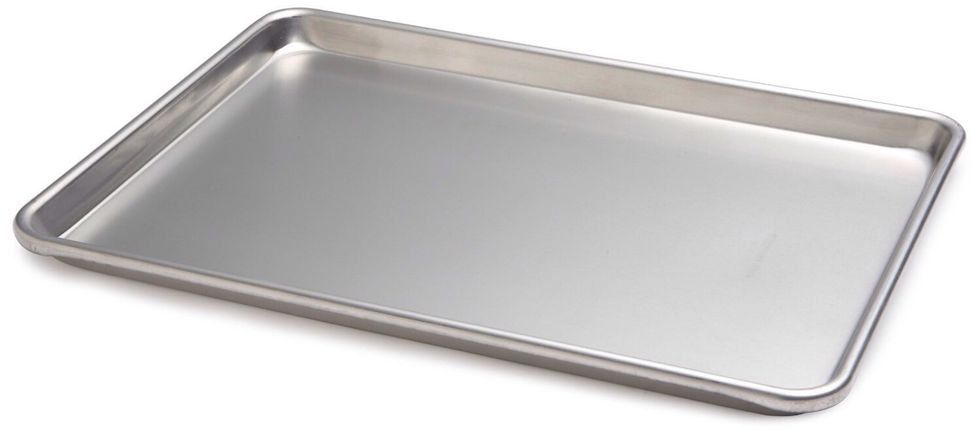 Cookie Sheet. Primarily used for baking cookies. I can use a cookie sheet to bake sugar cookies.