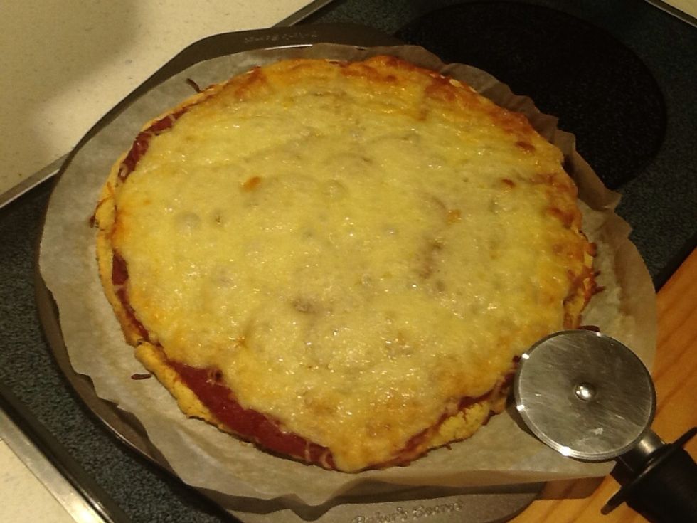 Cool a few minutes, not sure how many times I burnt my mouth hurrying into hot pizza. Cut and serve.