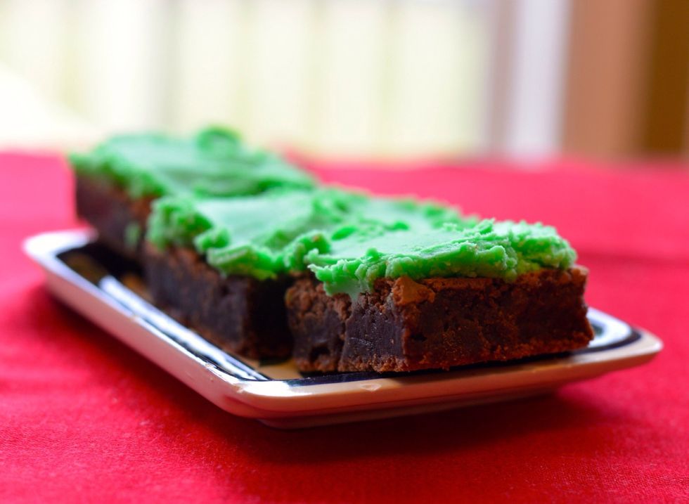 Cool brownies, cut into squares and frost!