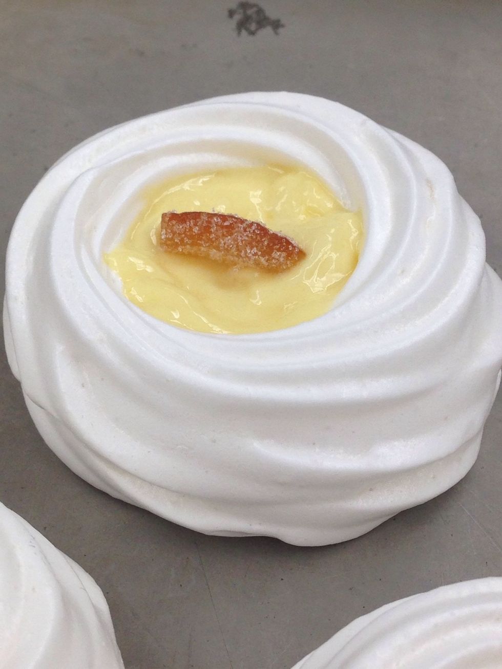 Cool completely and fill with lemon curd topped with a candied citrus peel