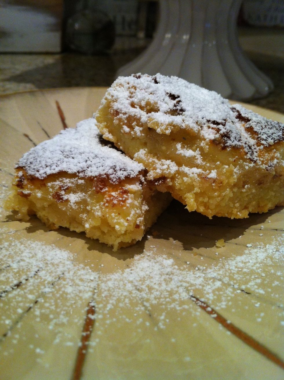 Cool, cut into blocks and dust icing sugar over them! Now, enjoy!