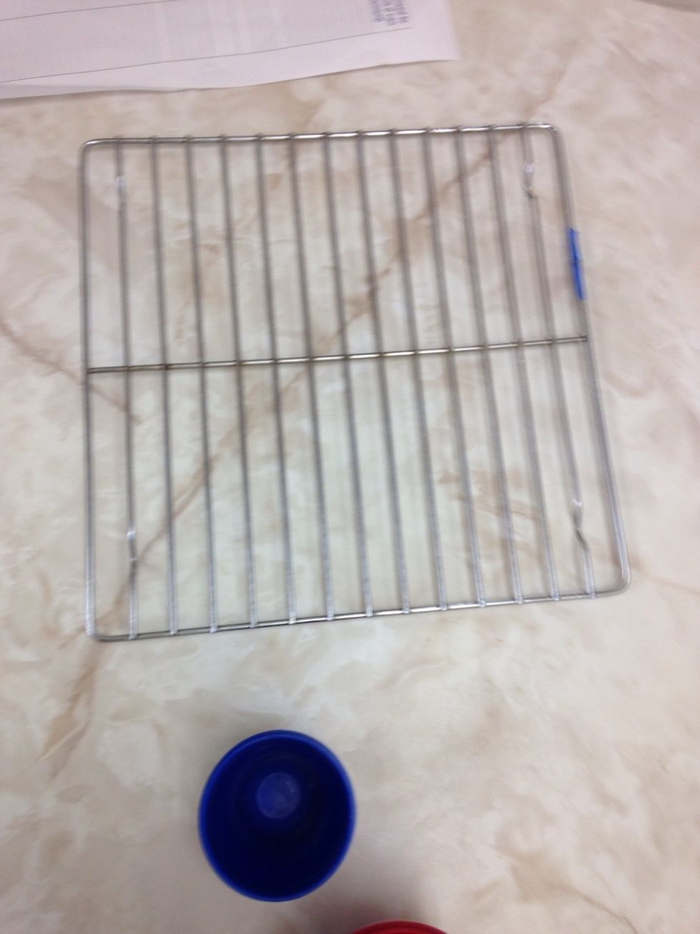 Cooling Rack  Used to cool of your finished goods when they are hot.   I can put hot food on the cooling rack so I won't burn my hands