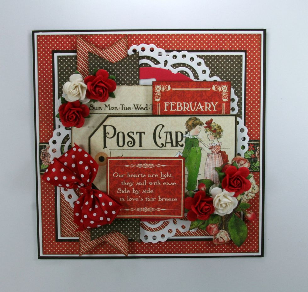 Coordinating roses and polka dot ribbon bow can now be attached.
