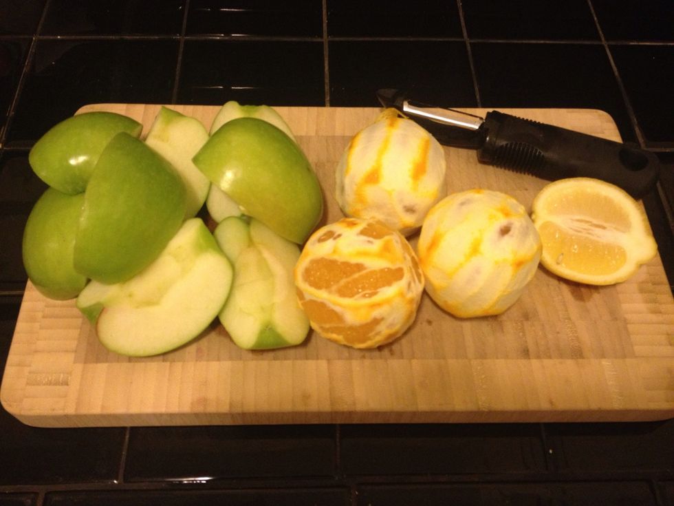 Core and cut the apples. This will help the arrangement in your juicing funnel. Orange rinds are bitter. Peel the rinds leaving as much pith as you can.