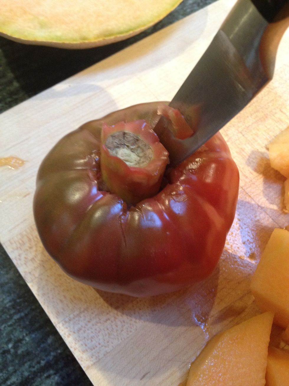 Core, peel and seed the tomatoes. It's important to remove the seeds, as they are impossible to pur\u00e9e. The skins need to be removed since they are bitter.