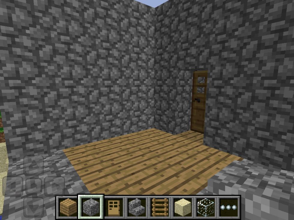 Corner off a section and add a door. This corner will act as a balcony. Remember to put glass cubes around the edge.