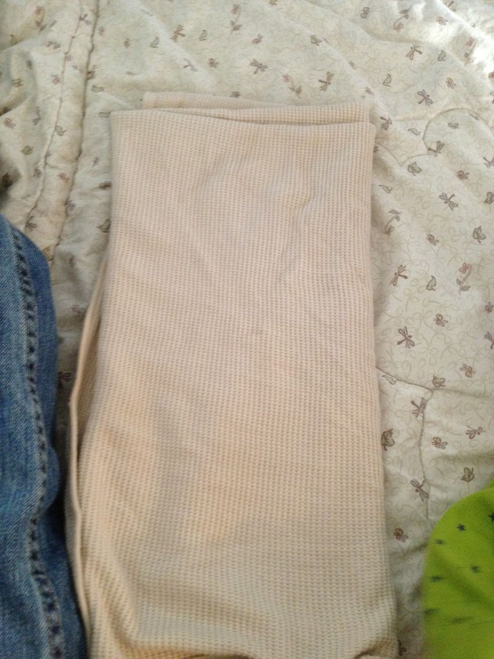 Cotton stretchy blanket seems to work the best.