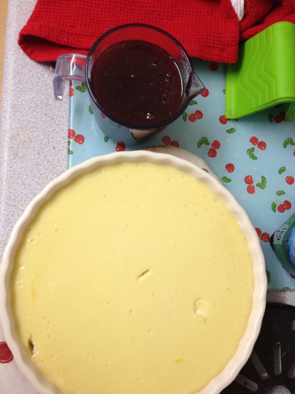 Coulis and cheesecake! Complete with prod marks. Thank you hubby... \ud83d\ude28