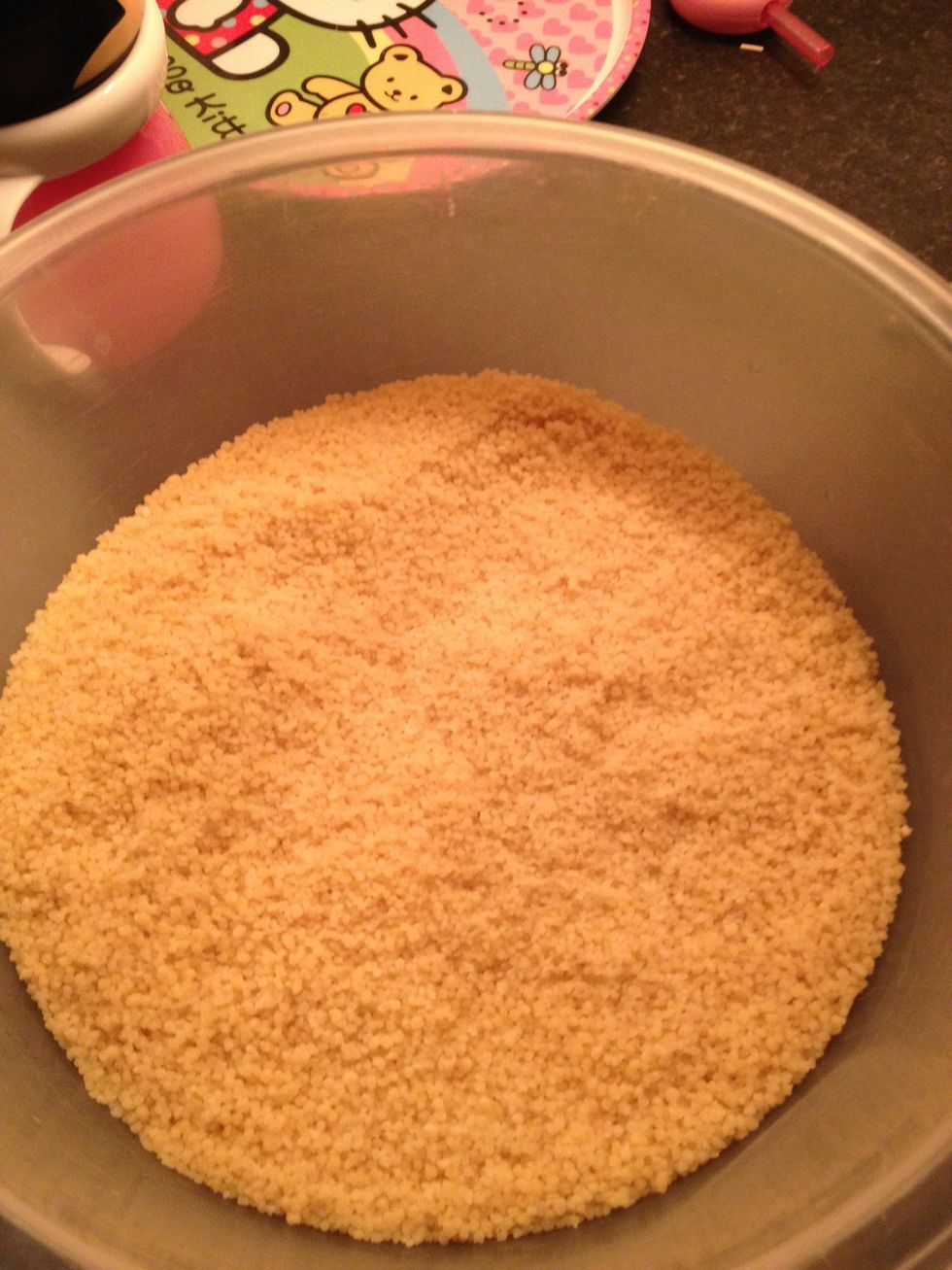 couscous. to 400g of dried couscous in a bowl, add 300ml water boiled, leave for ten minutes, will look like this