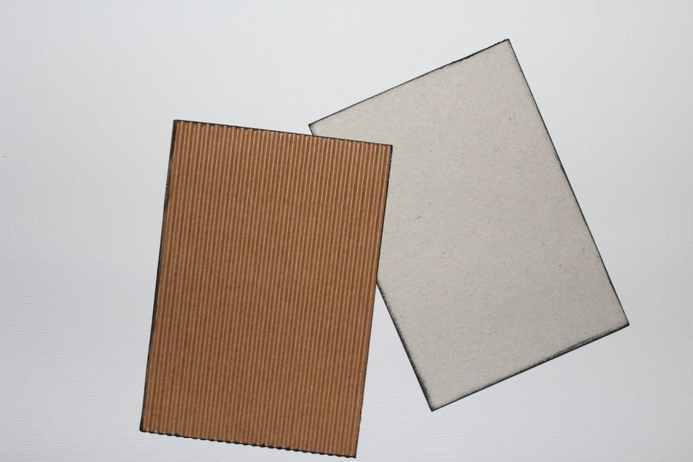 Cover 1 chipboard with corrugated cardstock previously inked borders. This is for the front cover